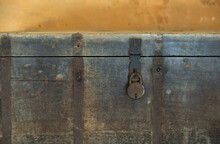 Old Iron Padlock On A Wooden Box In Museum