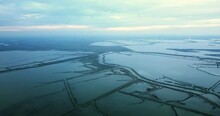 Amazing Famous Venetian Lagoon With Complicated Protective Barriers System And Azure Water Under Cloudy Sky Aerial Panorama