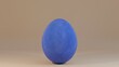 Osterei blau gefleckt mit Schriftzug frohe Ostern