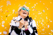 © oneinchpunch - Happy grandmother posing on colored backgrounds
