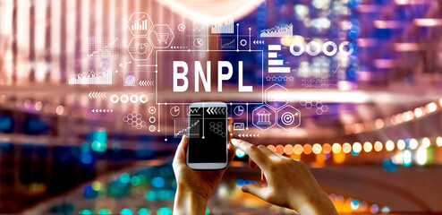 Sticker - BNPL - Buy Now Pay Later theme with big city lights at night