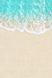 Soft ocean wave on white sand beach background