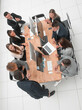 © ASDF - top view. business colleagues shaking hands at an office meeting.