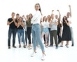 © ASDF - young woman standing in front of a group of diverse youth