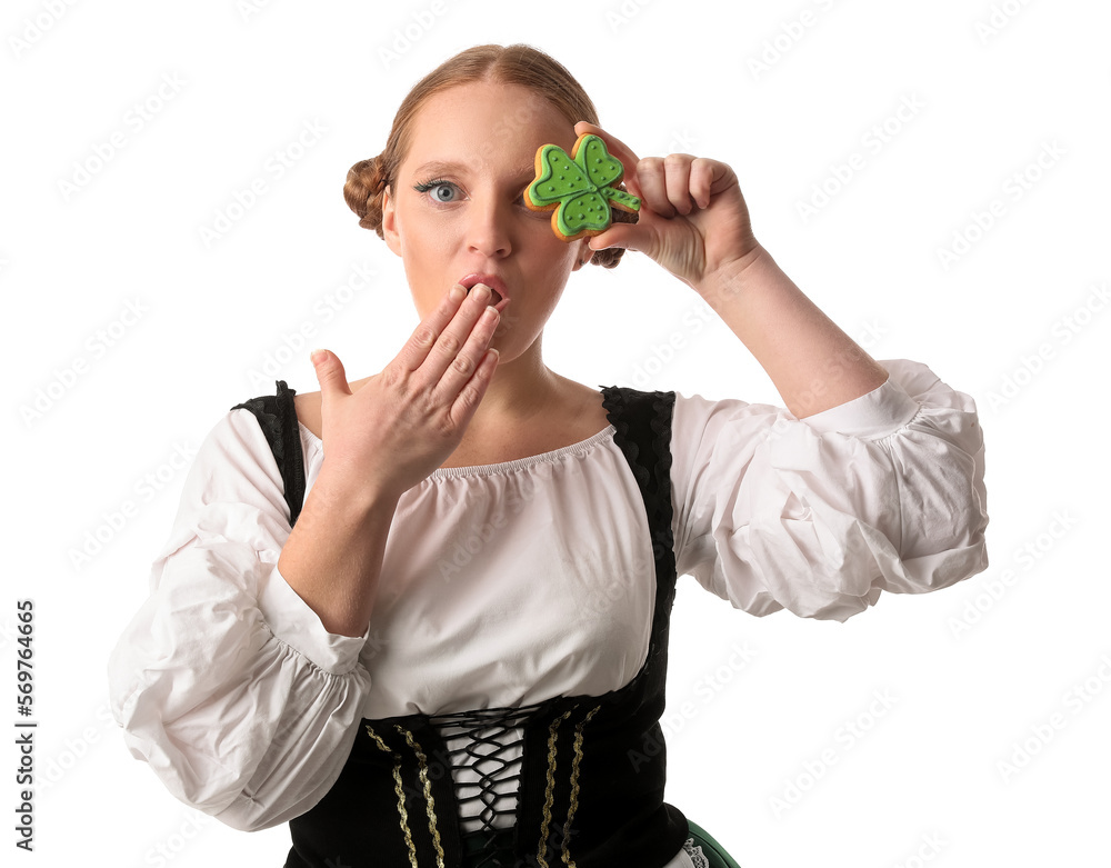 Shocked Irish waitress with cookie on white background. St. Patrick's Day celebration