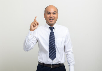 Portrait of Young asian businessman on isolated white background. Handsome middle aged Indian businessman in office uniform.