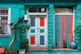 Fototapeta  - Colorful walls and colorful wooden doors of beautiful old houses of TİREBOLU.GİRESUN