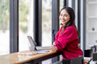 © David - Happy Young Indian Asian Business woman sitting on Digital Tablet work desk Workplace.