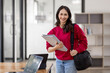 © David - Portrait of Cheerful Indian beautiful Asian female female student enhancing her future by attending regular lectures