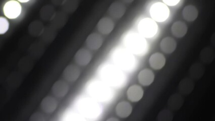 Wall Mural - Diagonal movement of dotted lines. Loop 4K video. Glowing Bokeh Lines Motion. Retro style looped background. Movement of white Blur lights dots. 