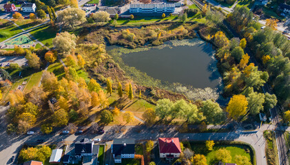 Poster - Autumn view of Ludvika town and Väsman lake in Sweden at sunset.