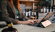 © Nuttapong punna - AML Anti Money Laundering Financial Bank Business Concept. judge in a courtroom using laptop and tablet with AML anti money laundering icon on virtual  screen. .