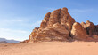 © Travelanza - Vast, rugged mountainous desert landscape with red sand of Wadi Rum in Jordan, Middle East