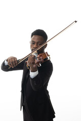 African american man in suit plays the violin in studio against white background