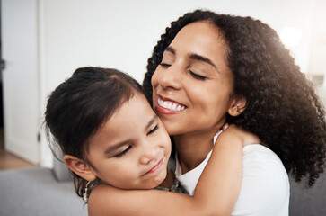 hug, love and girl with mother on a sofa, happy and smile while hugging in their home together. fami