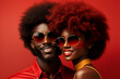 © unai - Half-length portrait, stock photography portrait of afro-haired man and woman wearing sunglasses smiling, red background. Ai generated art
