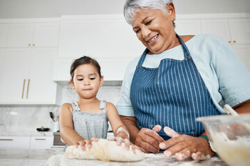 Canvas Print - Learning, cooking dough and grandmother with girl in kitchen baking dessert or pastry. Education, family care and happy grandma teaching kid how to bake, bonding and enjoying quality time together.