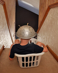 bored child at home in basket