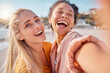 © Lumeez/peopleimages.com - Women, beach and selfie portrait on summer, vacation or holiday with funny, crazy and happy smile. Travel, face and freedom by friends hug for photo, profile picture or social media post in Miami