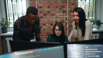 active discussion of team of web developers of designers in office, multiethnic man and women