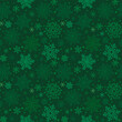 © Evgeniya - christmas background with green snowflakes