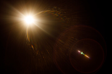Aufkleber - Easy to add lens flare effects for overlay designs or screen blending mode to make high-quality images. Abstract sun burst, digital flare, iridescent glare over black background.