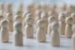 © megaflopp - Many wooden figures standing close to each other, shallow depth of field.