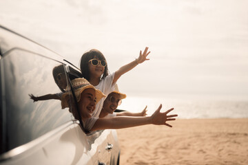 Wall Mural - Hand out car window. Happy travel at beach. Family in car happy together enjoy with traveling. gesture happy travel images