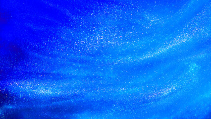 Wall Mural - abstract blue background with tints of silver sparkles. liquid glitter background with small glowing