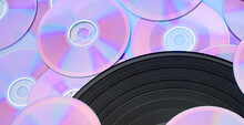 Beautiful Background With A Vinyl Record And CDs. Music Entertainment Technology Concept