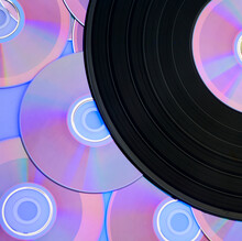 Beautiful Background With A Vinyl Record And CDs. Music Entertainment Technology Concept