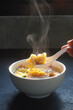 egg noodles with pork wonton soup or pork dumplings soup and vegetable - Asian food style.hot food