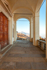 Wall Mural - The front colonnade of Madonna del Sasso sanctuary, on the hills surrounding Lake Orta (Piedmont Northern Italy), is an ancient Christian church, built in the 18th century, in honor of the Holy Mary.