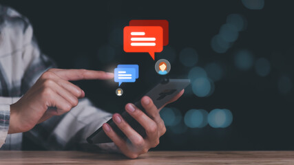 young man pointing virtual icon ,Conversation in the chat box icon,social media creation ideas,Chatting and commenting with social networks ,response and chat customer service,online communication