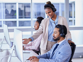 Leinwandbilder - Business people, call center and mentor coaching consultant in telemarketing, sales or advice at the office. Female leader agent helping employee in contact us for customer support or service at desk