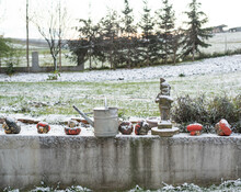 Graden Gnome Stone And Tin Watering Can, Rustic Decoration In The Garden In The Winter Time