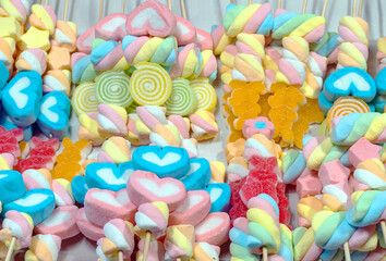 mix marchmellow and yelly with sugar dessert in wood stick for sweet party