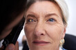 © K Davis/peopleimages.com - Woman, face and eye exam lamp for medical glasses, prescription lens or mature glaucoma disease. Zoom, optician and optometry patient in test, ophthalmologist consulting or healthcare wellness vision