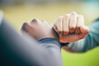 © C. D./peopleimages.com - Hands, fist bump and sports teamwork for motivation, collaboration and success. Team building, support and people, man and woman together for workout, training targets and exercise goals outdoors.
