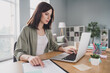 © deagreez - Photo of charming intelligent lady write economy finance statistic check weekly report use netbook macbook office room home indoor