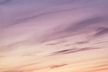 Wall Mural - Sky with soft and fluffy pastel pink and blue colored clouds. Sunset background. Nature. sunrise. Instagram toned style