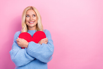 Sticker - Photo of dreamy cute positive lady hand hold red paper card interested look empty space isolated on pink color background