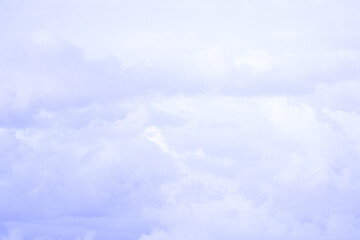 Wall Mural - Sky with soft and fluffy pastel lilac pink and blue colored clouds. Sunset background. Nature. sunrise. Instagram toned style