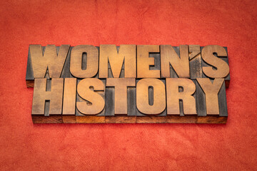 women's history - word abstract in vintage letterpress wood type, contributions of women to events i