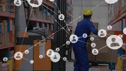 Wall Mural - Animation of network of profiles over caucasian male worker loading boxes in forklift at warehouse