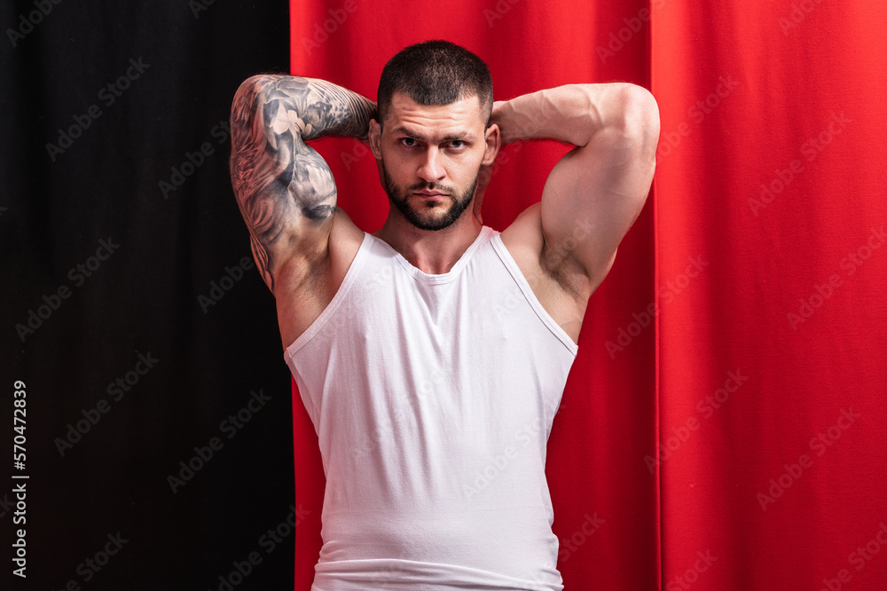 Sexy and naked muscular young man sensual posing. Sexy shirtless male model. Attractive young