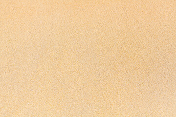 Wall Mural - Yellow sand texture close up background, sandy pattern, natural fine sand grains backdrop, clean flat beige sand top view, light brown desert dune surface, summer tropical sea beach banner, copy space