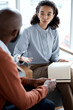 © Rene La/peopleimages.com - Psychology, therapy and black people, psychologist and client talking of mental health, stress or career problem. Counseling, therapist and professional USA woman consulting patient, help or advice