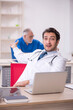 © Elnur - Two male doctors working in the clinic