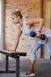 © Joanrae P/peopleimages.com - Bodybuilder goal, dumbbell focus and woman in gym for training, sports and exercise wellness. Thinking, sport strong and athlete with weights for fitness and health workout performance for muscle